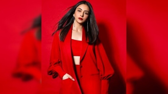 Rakul Preet paired her red pantsuit with a pair of silver stillettos. Pantsuits also look great when teamed with sneakers.(Instagram/@rakulpreet)