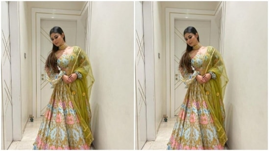 Mouni ditched the bright colours and picked a pastel multicoloured lehenga for this year.(Instagram/@imouniroy)