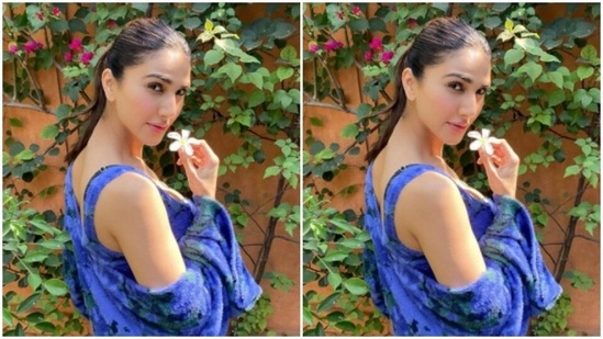Vaani held a small flower as she posed for the cameras.(Instagram/@_vaanikapoor_)
