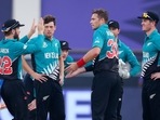 New Zealand's captain Kane Williamson, left, congratulates Tim Southee after he dismissed Scotland's Matthew Cross during the Cricket Twenty20 World Cup match between New Zealand and Scotland in Dubai, UAE, (AP) New Zealand's captain Kane Williamson, left, congratulates Tim Southee after he dismissed Scotland's Matthew Cross during the Cricket Twenty20 World Cup match between New Zealand and Scotland in Dubai, UAE, (AP)