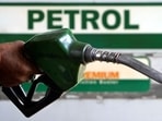 An attendant holds a nozzle at a petrol pump in the northeastern city of Siliguri.&nbsp;