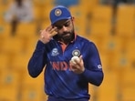 India's captain Virat Kohli holds the ball before handing it over to the next bowler during the Cricket Twenty20 World Cup match between India and Afghanistan in Abu Dhabi.(AP) India's captain Virat Kohli holds the ball before handing it over to the next bowler during the Cricket Twenty20 World Cup match between India and Afghanistan in Abu Dhabi.(AP)