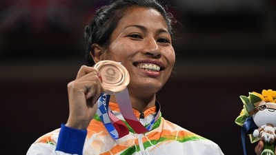 Bronze medallists Lovlina Borgohain of India poses for photos. Pool via REUTERS/Luis Robayo (REUTERS)
