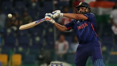 India's Rohit Sharma hits a boundary during the Cricket Twenty20 World Cup match between India and Afghanistan in Abu Dhabi, UAE, Wednesday, Nov. 3, 2021. (AP Photo/Aijaz Rahi) (AP)