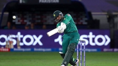 Pakistan's Asif Ali plays a shot during the Cricket Twenty20 World Cup match between Pakistan and Afghanistan in Dubai, UAE, Friday, Oct. 29, 2021. (AP)