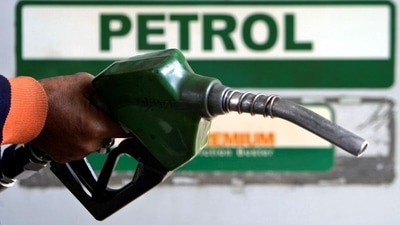 An attendant holds a nozzle at a petrol pump in the northeastern city of Siliguri.&nbsp; (File Photo / REUTERS)