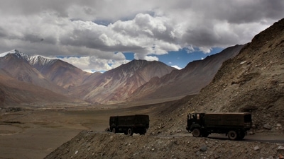 Indian army trucks drive near Pangong Tso lake in Ladakh. (AP File Photo)