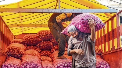 Labourers unload onion sacks from a truck at Azadpur Mandi, in New Delhi. (PTI File Photo) Labourers unload onion sacks from a truck at Azadpur Mandi, in New Delhi. (PTI File Photo)