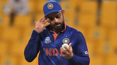India's captain Virat Kohli holds the ball before handing it over to the next bowler during the Cricket Twenty20 World Cup match between India and Afghanistan in Abu Dhabi. (AP) India's captain Virat Kohli holds the ball before handing it over to the next bowler during the Cricket Twenty20 World Cup match between India and Afghanistan in Abu Dhabi. (AP)