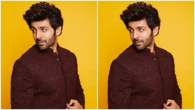 For Diwali, Kartik chose a maroon bandhgala kurta and paired it with a pair of black trousers. (Instagram/@kartikaaryan) For Diwali, Kartik chose a maroon bandhgala kurta and paired it with a pair of black trousers. (Instagram/@kartikaaryan)