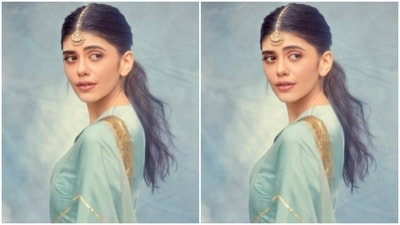 The saree is bordered in gold zari work. Sanjana teamed it with a silk blouse with Mandarin collars. (Instagram/@sanjanasanghi96) The saree is bordered in gold zari work. Sanjana teamed it with a silk blouse with Mandarin collars. (Instagram/@sanjanasanghi96)