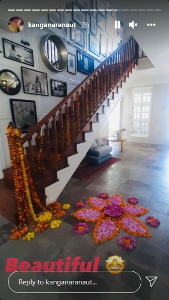 Kangana also gave a peek of the floral rangoli inside her home.
