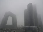A cold wave arriving from Siberia over the weekend is expected to disperse the pollution. In picture - Buildings are seen in the central business district on a polluted day in Beijing on November 5, 2021. A cold wave arriving from Siberia over the weekend is expected to disperse the pollution. In picture - Buildings are seen in the central business district on a polluted day in Beijing on November 5, 2021.