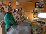 Head physician Lorenz Nowak treats a Covid-19 patient in the ICU of the Asklepios Clinic in Munich, Germany. Head physician Lorenz Nowak treats a Covid-19 patient in the ICU of the Asklepios Clinic in Munich, Germany. 