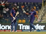 India's KL Rahul, left, and India's Rohit Sharma celebrate scoring runs during the Cricket Twenty20 World Cup match between India and Afghanistan in Abu Dhabi, UAE(AP) India's KL Rahul, left, and India's Rohit Sharma celebrate scoring runs during the Cricket Twenty20 World Cup match between India and Afghanistan in Abu Dhabi, UAE(AP)