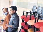 Pune Police after the arrest of Kiran Gosavi (left) at CP’s office at Agarkar Nagar on October 28. (HT) Pune Police after the arrest of Kiran Gosavi (left) at CP’s office at Agarkar Nagar on October 28. (HT)