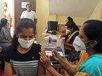 Department-wise responsibilities have been given to ensure 100 per cent vaccination of eligible persons with both the doses. (HT)