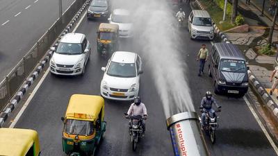 An anti-smog gun is used to spray water droplets to curb air pollution as a thick layer of smog engulfed the national Capital following Diwali celebrations, in New Delhi on Friday. Neighbouring Punjab has seen a sharp rise in the number of farm fires. (PTI) An anti-smog gun is used to spray water droplets to curb air pollution as a thick layer of smog engulfed the national Capital following Diwali celebrations, in New Delhi on Friday. Neighbouring Punjab has seen a sharp rise in the number of farm fires. (PTI)