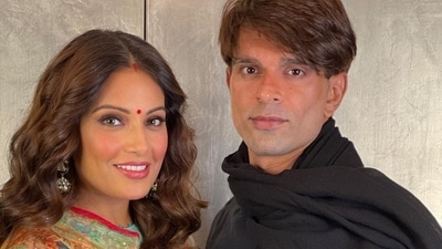 While Bipasha wore a floral salwar suit, Karan was dressed in a black kurta-pyjama. 