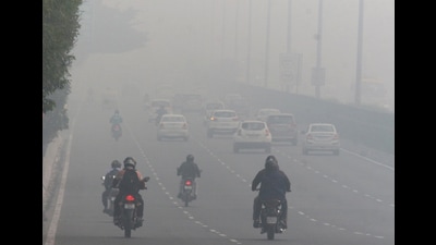 Vehicles ply amid low visibility due to smog during Diwali celebrations, in Gurugram on Friday. (Yogendra Kumar) Vehicles ply amid low visibility due to smog during Diwali celebrations, in Gurugram on Friday. (Yogendra Kumar)