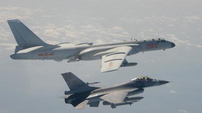 In this file photo, a Taiwanese F-16 fighter jet flying next to a Chinese H-6 bomber (top) off the coast of Taiwan. China for the first time said Taiwanese politicians who support the island’s independence will be made “criminally liable for life”, and will be barred from entering, or having any connection with, the mainland. (AFP) In this file photo, a Taiwanese F-16 fighter jet flying next to a Chinese H-6 bomber (top) off the coast of Taiwan. China for the first time said Taiwanese politicians who support the island’s independence will be made “criminally liable for life”, and will be barred from entering, or having any connection with, the mainland. (AFP)