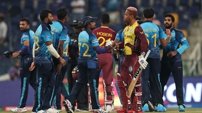West Indies' Shimron Hetmyer congratulates Sri Lankan cricketers after Sri Lanka won the Cricket Twenty20 World Cup match between Sri Lanka and West Indies in Abu Dhabi, UAE, Thursday, Nov. 4, 2021.&nbsp; (AP)