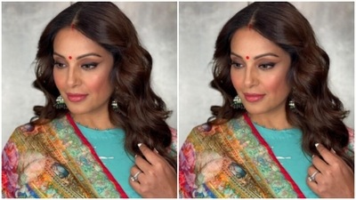 Styled by fashion stylist Eshaa Amiin, Bipasha left her long tresses open in wavy curls. (Instagram/@bipashabasu) Styled by fashion stylist Eshaa Amiin, Bipasha left her long tresses open in wavy curls. (Instagram/@bipashabasu)