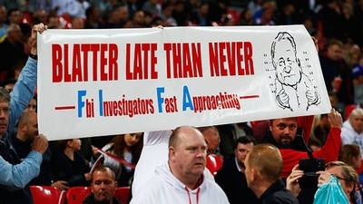 Fans hold a banner protesting against Sepp Blatter. (Getty) Fans hold a banner protesting against Sepp Blatter. (Getty)
