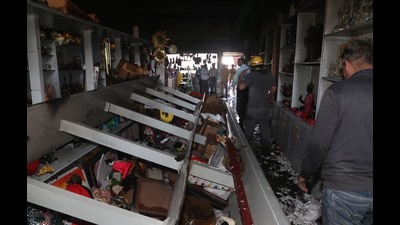 A gift shop was gutted in a fire incident at Sector 11, Panchkula, on Friday. (Sant Arora / HT)