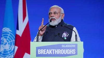 India's Prime Minister Narendra Modi delivers a speech at the COP26 UN Climate Change Conference in Glasgow, Scotland, on November 2, 2021 (AFP) India's Prime Minister Narendra Modi delivers a speech at the COP26 UN Climate Change Conference in Glasgow, Scotland, on November 2, 2021 (AFP)