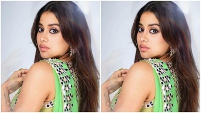 The embellished saree is bordered with silver mirrors. (Instagram/@janhvikapoor) The embellished saree is bordered with silver mirrors. (Instagram/@janhvikapoor)