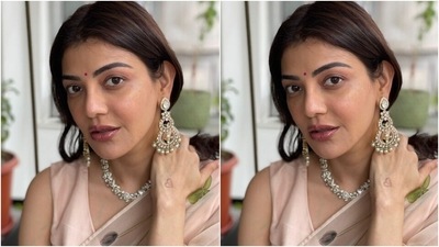 Kajal's beauty picks with the ethnic attire included a dainty red bindi, berry-toned lip shade, glowing skin, blushed cheeks, on-fleek eyebrows, and shimmery eye shadow. What do you think of Kajal's ethereal look? (Instagram/@sayali_vidya) Kajal's beauty picks with the ethnic attire included a dainty red bindi, berry-toned lip shade, glowing skin, blushed cheeks, on-fleek eyebrows, and shimmery eye shadow. What do you think of Kajal's ethereal look? (Instagram/@sayali_vidya)