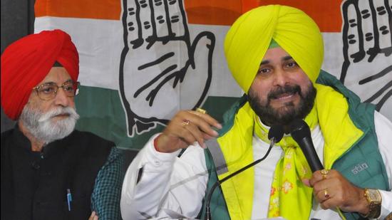 Punjab Congress chief Navjot Singh Sidhu addresses the media at the Chandigarh Press Club on Friday. (Keshav Singh/HT)