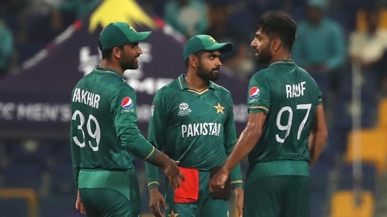 Pakistan's Haris Rauf, right, celebrates the dismissal of Namibia's JJ Smit tduring the Cricket Twenty20 World Cup match between Pakistan and Namibia in Abu Dhabi, UAE, Tuesday, Nov. 2, 2021 (AP)
