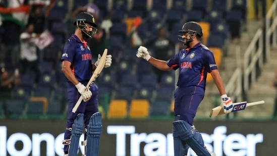 India's KL Rahul, left, and India's Rohit Sharma celebrate scoring runs during the Cricket Twenty20 World Cup match between India and Afghanistan in Abu Dhabi, UAE(AP)