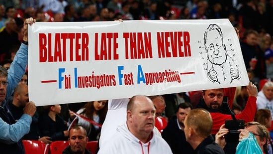 Fans hold a banner protesting against Sepp Blatter.&nbsp;(Getty)