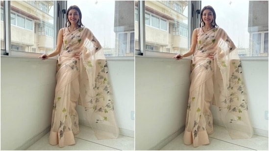 Kajal accessorised her traditional attire with a floral neckpiece, stone and pearl-adorned chandelier earrings, and rings. She kept her shoulder-length tresses, blow-dried to give a chic look, open in a centre-parting.(Instagram/@sayali_vidya)