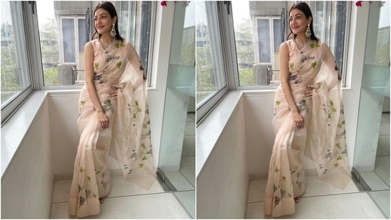 The couple decked up in traditional ensembles for the festivities. Kajal chose a stunning floral sheer saree from the label, Picchika, and Gautam looked dapper in a silk red bandhgala kurta and pyjama set.(Instagram/@sayali_vidya)