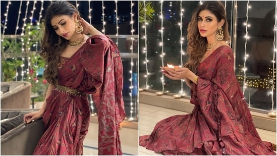 Mouni chose a pre-pleated ruffled saree from the shelves of the clothing label, Prints By Radhika, for Diwali 2021. The maroon hand-painted attire came adorned with ruffled details and intricate details that made it a standout piece.(Instagram/@imouniroy)
