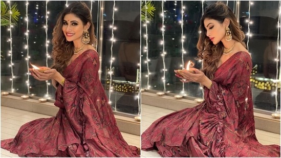 Mouni teamed the drape with a spaghetti-strapped backless blouse beautified with beaded tassels and a square neckline. Unlike the saree, the bralette-styled top featured sequinned hand embroidery all over.(Instagram/@imouniroy)