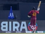 West Indies' Chris Gayle waves as he walks from the field during the Cricket Twenty20 World Cup match between Australia and the West Indies in Abu Dhabi, UAE, Saturday, Nov. 6, 2021. West Indies' Chris Gayle waves as he walks from the field during the Cricket Twenty20 World Cup match between Australia and the West Indies in Abu Dhabi, UAE, Saturday, Nov. 6, 2021.