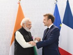 PM Modi with President Emmanuel Macron at G20 summit in Rome. PM Modi with President Emmanuel Macron at G20 summit in Rome.