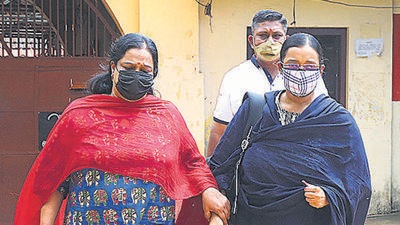 Kerala gold smuggling case prime accused Swapna Suresh (right) walks out of jail in Thiruvananthapuram on Saturday. (PTI) Kerala gold smuggling case prime accused Swapna Suresh (right) walks out of jail in Thiruvananthapuram on Saturday. (PTI)
