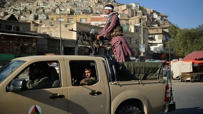 Taliban fighters patrol along a street in Kabul. (AFP) Taliban fighters patrol along a street in Kabul. (AFP)