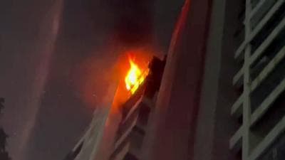 A fire breaks out at the Hansa Heritage building, at Kandivali, in Mumbai on Saturday. An earthen lamp (diya) kept in the balcony of a 14th-floor house is likely to have caused the fire. (ANI) A fire breaks out at the Hansa Heritage building, at Kandivali, in Mumbai on Saturday. An earthen lamp (diya) kept in the balcony of a 14th-floor house is likely to have caused the fire. (ANI)