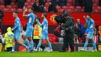 Manchester City's players celebrate after winning the English Premier League soccer match between Manchester United and Manchester City at Old Trafford stadium in Manchester, England, Saturday, Nov. 6, 2021. Manchester City won 2-0. (AP) Manchester City's players celebrate after winning the English Premier League soccer match between Manchester United and Manchester City at Old Trafford stadium in Manchester, England, Saturday, Nov. 6, 2021. Manchester City won 2-0. (AP)