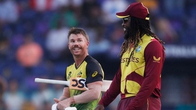 Cricket - ICC Men's T20 World Cup - Super 12 - Group 1 - Australia v West Indies - Zayed Cricket Stadium, Abu Dhabi, United Arab Emirates - November 6, 2021 West Indies' Chris Gayle with Australia's David Warner after the match REUTERS/Hamad I Mohammed (REUTERS)