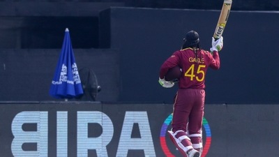 West Indies' Chris Gayle waves as he walks from the field during the Cricket Twenty20 World Cup match between Australia and the West Indies in Abu Dhabi, UAE, Saturday, Nov. 6, 2021. (AP) West Indies' Chris Gayle waves as he walks from the field during the Cricket Twenty20 World Cup match between Australia and the West Indies in Abu Dhabi, UAE, Saturday, Nov. 6, 2021. (AP)