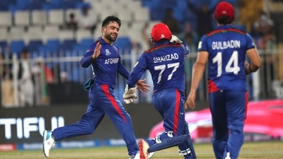 Afghanistan's Rashid Khan celebrates the wicket of Scotland's Brad Wheal during the Cricket Twenty20 World Cup match between Afghanistan and Scotland in Sharjah, UAE, Monday, Oct. 25, 2021. (AP) Afghanistan's Rashid Khan celebrates the wicket of Scotland's Brad Wheal during the Cricket Twenty20 World Cup match between Afghanistan and Scotland in Sharjah, UAE, Monday, Oct. 25, 2021. (AP)