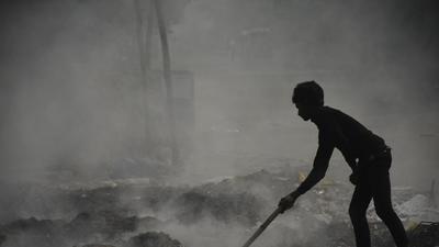 Garbage being burnt in the open in Sahibabad, near the Kaushambi Metro station in Ghaziabad on Saturday, a day when the city emerged the most polluted in the country. (Sakib Ali/HT photo) Garbage being burnt in the open in Sahibabad, near the Kaushambi Metro station in Ghaziabad on Saturday, a day when the city emerged the most polluted in the country. (Sakib Ali/HT photo)